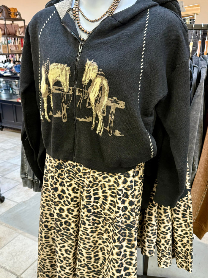 Leopard print cotton sweatpants with wide legs and stitched cuffs