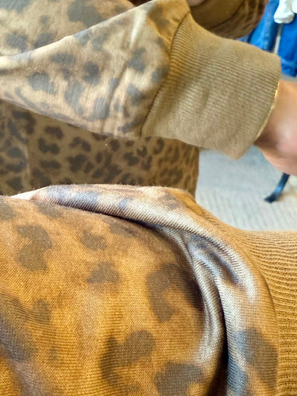 Leopard print hoodie fabric with ribbed knit cuff and hem, long sleeve