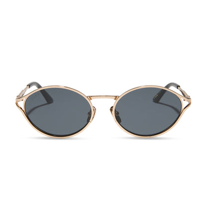 jessie james decker x diff eyewear featuring the limoncello oval sunglasses with a gold frame and grey lenses front view