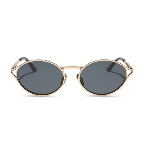 jessie james decker x diff eyewear featuring the limoncello oval sunglasses with a gold frame and grey lenses front view