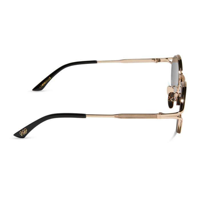 jessie james decker x diff eyewear featuring the limoncello oval sunglasses with a gold frame and grey lenses side view