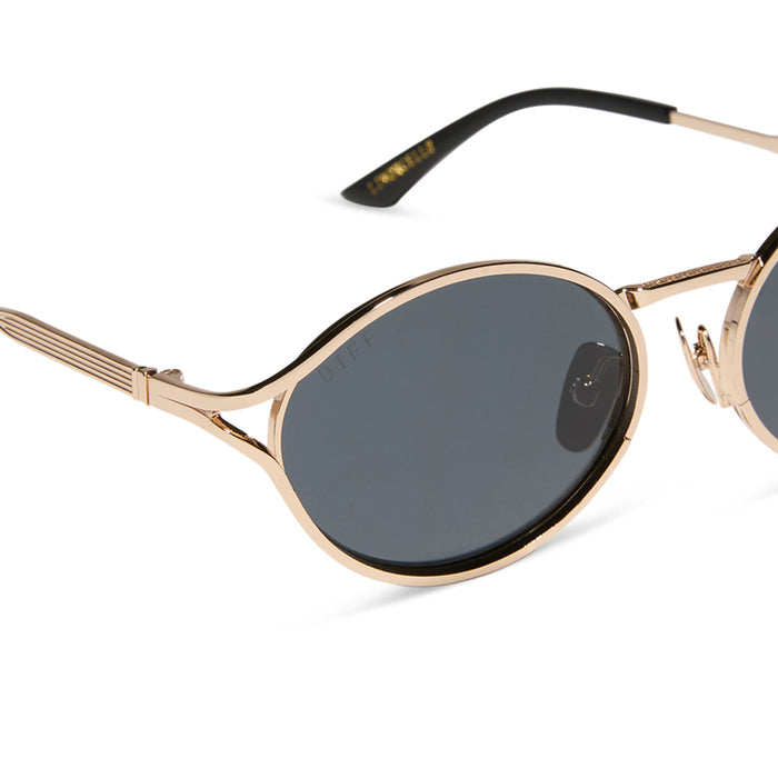 jessie james decker x diff eyewear featuring the limoncello oval sunglasses with a gold frame and grey lenses detailed view