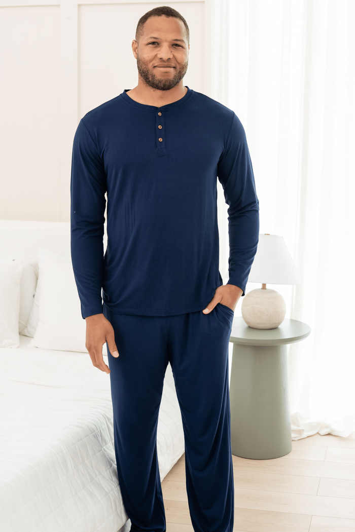 Male modeling Men's Lounge Pants in Navy and matching henley tee