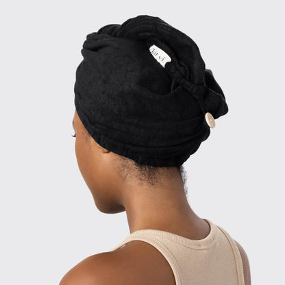 Model wearing the Black Microfiber Hair Towel wrapped around her hair.