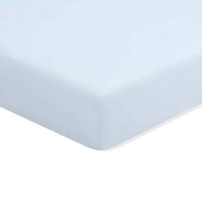 Mini Crib Sheet in Breeze shown on a mattress