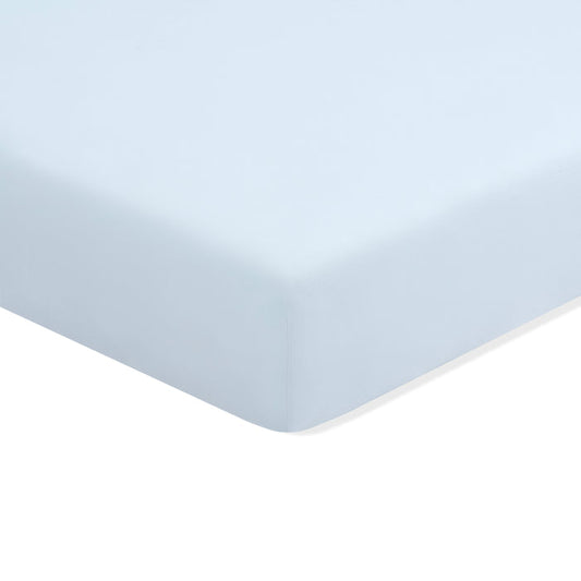 Mini Crib Sheet in Breeze shown on a mattress