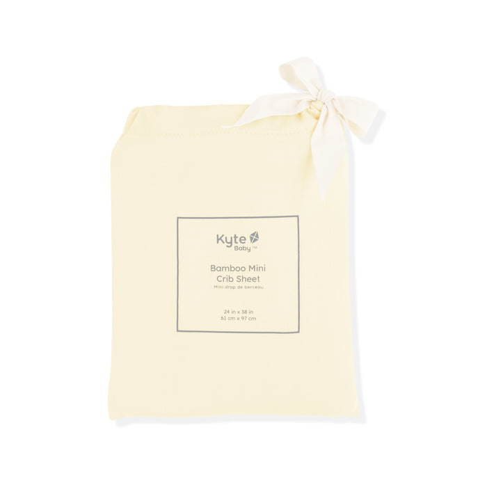 Mini Crib Sheet in Chamomile shown in its packaging