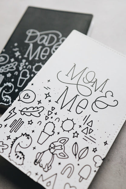 Mom & me journal mostly obscuring dad & me journal