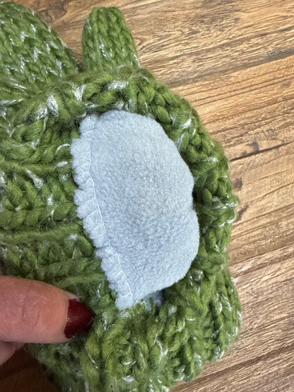 Cable knit mitten with light gray felt palm patch and ribbed cuff detail