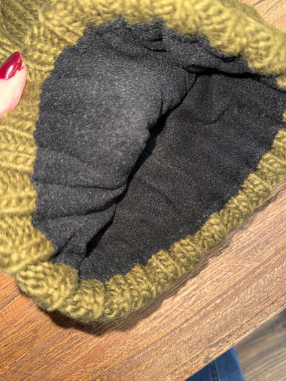 Olive cuff beanie with dark gray inner lining and knit border