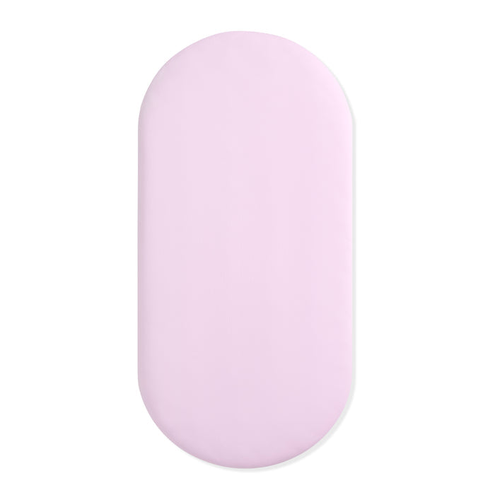 Light purple oval bassinet sheet on a white background