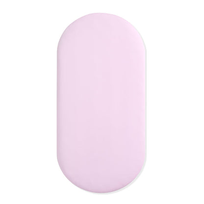 Light purple oval bassinet sheet on a white background