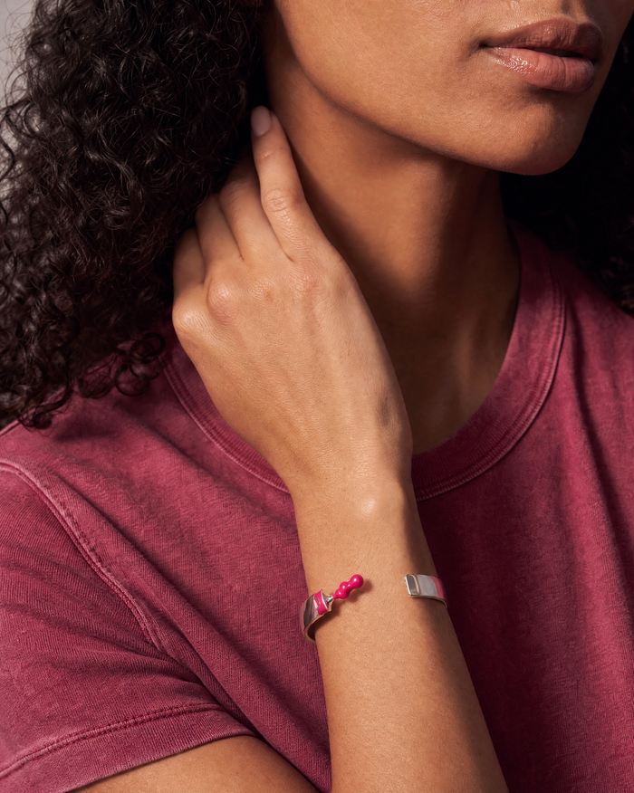 alex-and-ani_cuff-bracelet-hand-on-neck_260717_81c2a4.png