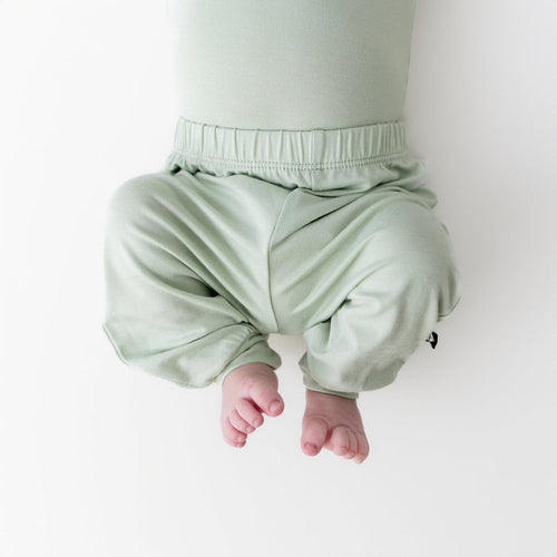 close up of the Pant in Basil on a newborn