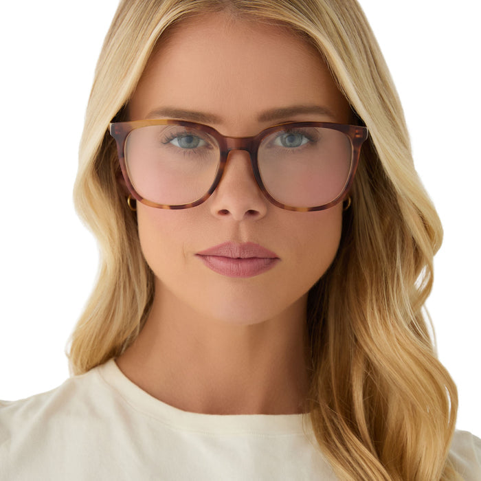 on model - female wearing diff eyewear featuring the parker square prescription glasses with a brown fleur frame front view