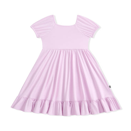 Lavender dress with ruffled sleeves and hem on a white background