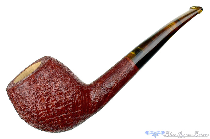 Blue Room Briars is proud to present this RC Sands Pipe Bent Sandblast Apple with Dark Amber Stem