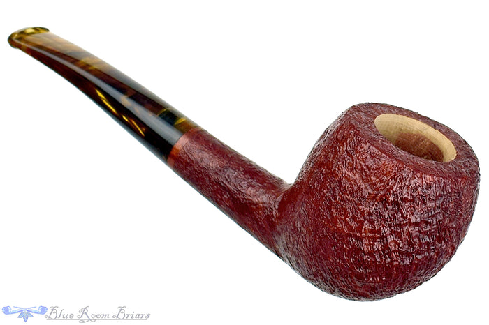 Blue Room Briars is proud to present this RC Sands Pipe Bent Sandblast Apple with Dark Amber Stem