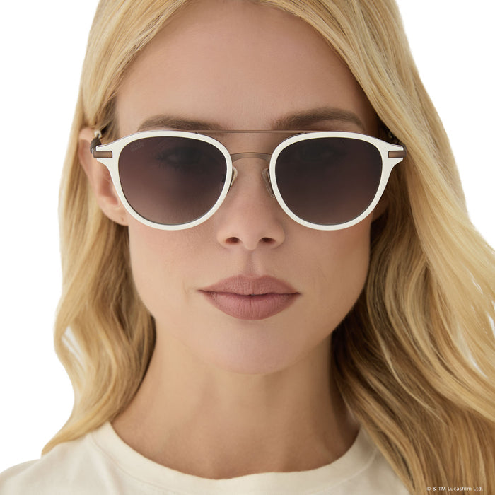 on model - female wearing star wars x diff eyewear featuring the rey™ round sunglasses with a off white + bronze frame and brown gradient polarized lenses front view