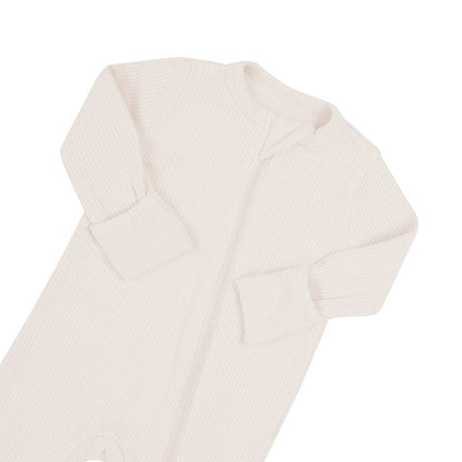 Zipper garage on Kyte Baby bamboo Ribbed Zippered Romper in Oat