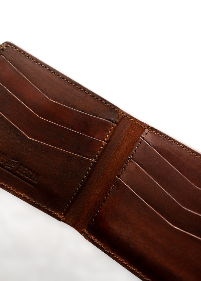 Open brown leather wallet with multiple card slots, showcasing detailed stitching and a smooth finish on a white background.
