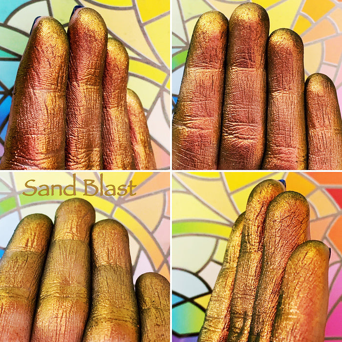 Finger swatches of Sand Blast Jewelled Multichrome Eyeshadow angle shifts orange-gold-lime