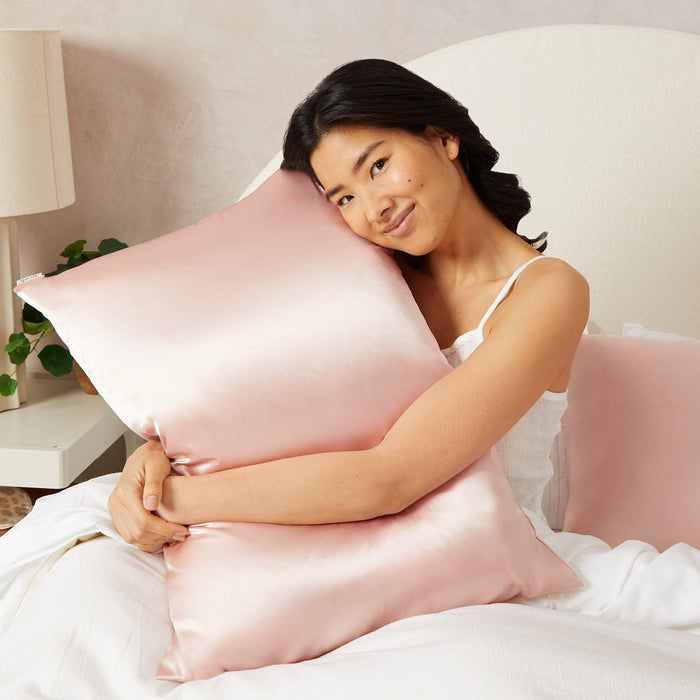 Detail close-up of Kitsch Blush Satin Pillowcase showing smooth, hair-friendly satin texture