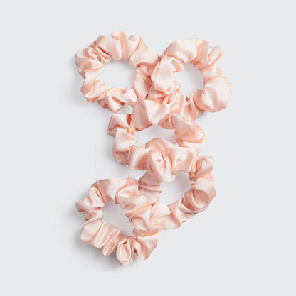 KITSCH Satin Sleep Scrunchies in Blush — product shot of blush pink satin sleep scrunchie — silky satin won't crimp or agitate hair while you sleep