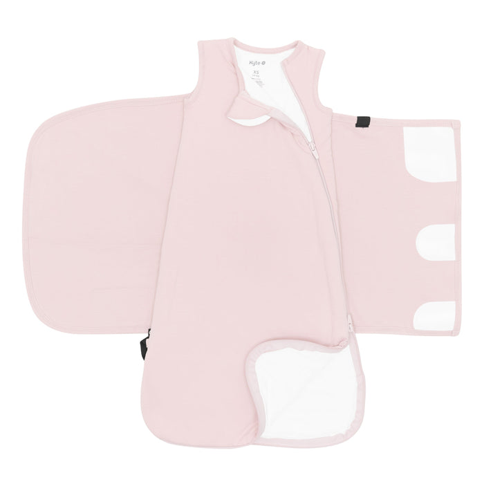 Sleep Bag Swaddler in Blush 1.0 unswaddled showing the double zipper on the top and bottom zipper track