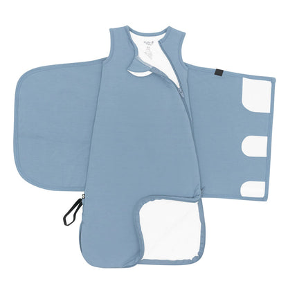Zipper garage, double zipper and adjustable velcro swaddle wrap shown on an unswaddled Sleep Bag Swaddler in Slate 1.0