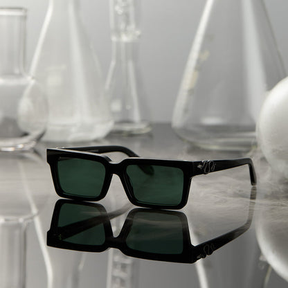lifestyle - surrounded by potion flask harry potter x diff eyewear featuring professor snape 2.0 square  sunglasses with a black frame and g15 lenses front view