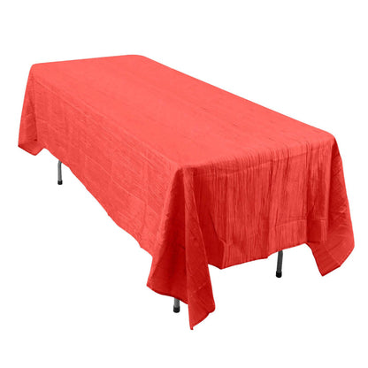 Red tablecloth draped over a rectangular table