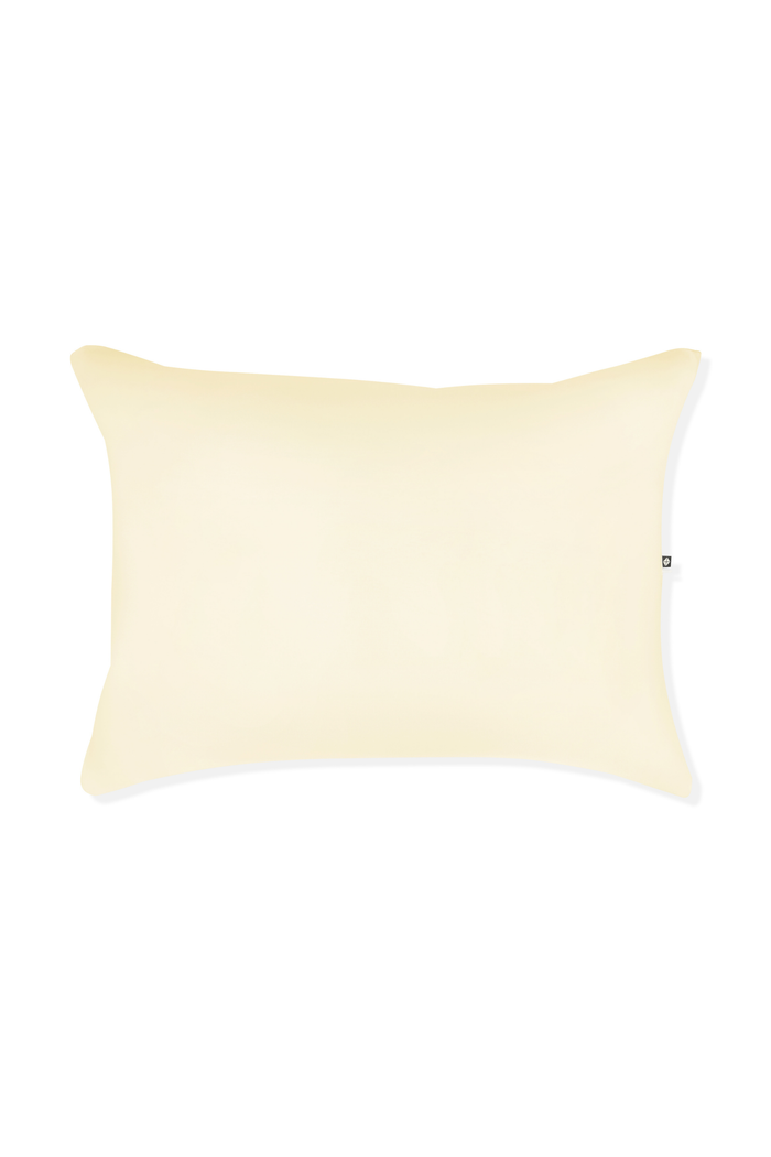 Yellow pillow on white background