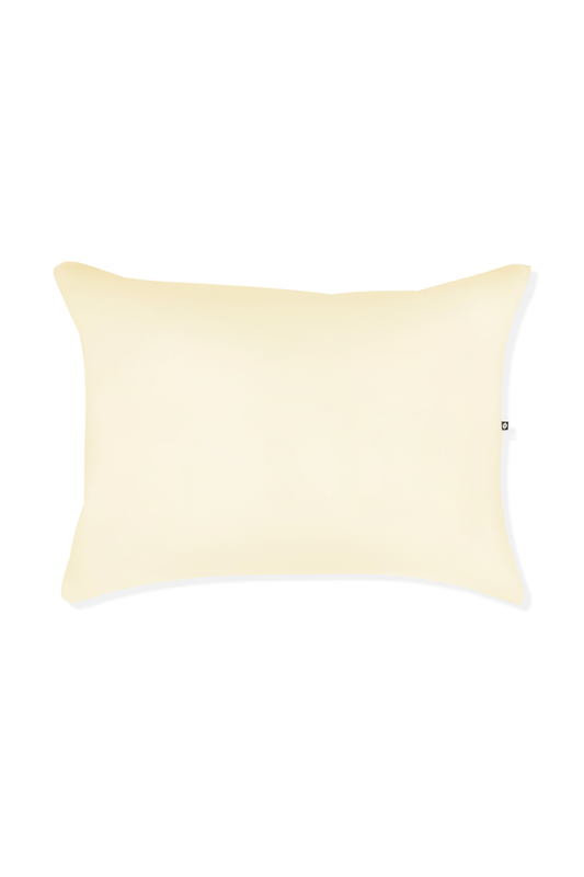 Yellow pillow on white background