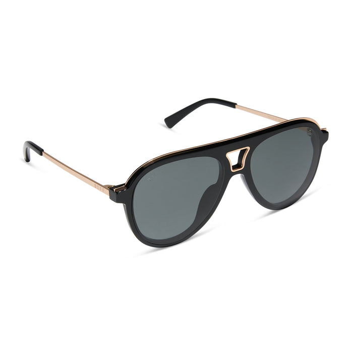 diff eyewear featuring the tosca iii aviator sunglasses with a black frame with gold rim and grey polarized lenses angled view