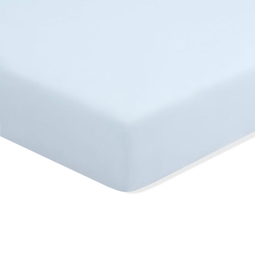 Twin Sheet in Breeze shown on a mattress