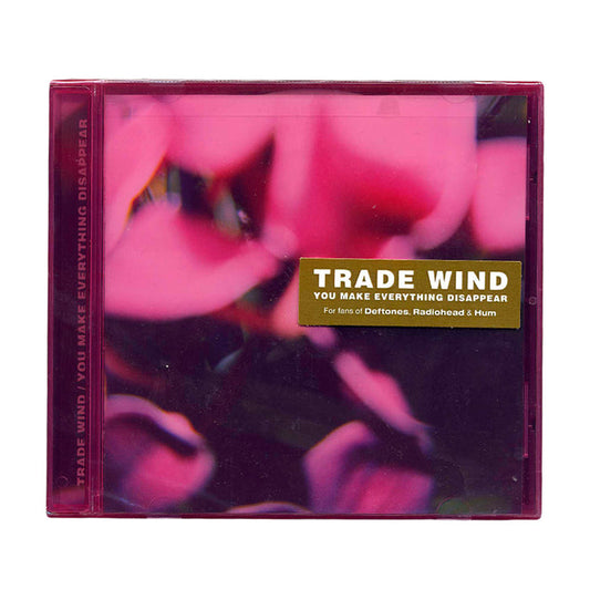 A CD case featuring abstract floral art for Trade Wind’s You Make Everything Disappear, with label and gold sticker showing the track list—perfect for fans of Deftones, Radiohead, and Hum.
