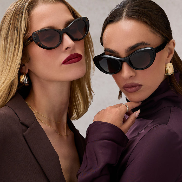 group shot of two females wearing diff eyewear zaria espresso tortoise and zaria black sunglasses