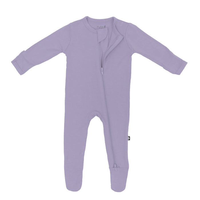 Dual zipper partially unzipped from the top on a Zippered Footie in Taro